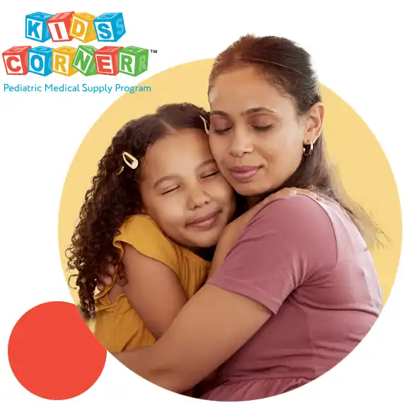 Mom hugging daughter that has spina bifida